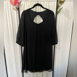 Black BCX midi black dress. Black sheer sleeves in large